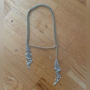 Kendra Scott, gold wrap necklace with crystal detailing in the pendants